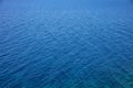Deep blue sea water surface. Calm sea background texture Royalty Free Stock Photo