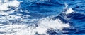 Deep blue sea water. Sea waves with white foam and spray Royalty Free Stock Photo