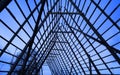 Deep blue sky on the background with old wooden stockfish structure in the front of the frame