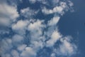 Deep blue sky with white fluffy clouds Royalty Free Stock Photo