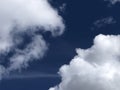 Deep Blue Sky with White Fluffy Face Profile