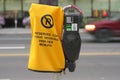 Deep Bokeh Parking meters with reserved for food vendors bag on Franklin avenue in Yellowkn