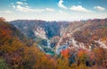 Deep canyon in Plitvice National Park, Croatia, Europe. Colorful morning view of pure water waterfall in Plitvice. Splendid autumn Royalty Free Stock Photo