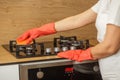 Deep Cleaning Gas Stove Burners with Sponge Royalty Free Stock Photo