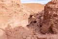 Deep crack in the rock leading down to a Hidden Lake near the Timna park,surrounded by mountains near Eilat city, Arava Valley, Royalty Free Stock Photo