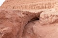 Deep crack in the rock leading down to a Hidden Lake near the Timna park,surrounded by mountains near Eilat city, Arava Valley, Royalty Free Stock Photo