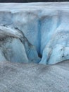 A deep crevice in a glacier