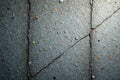 Deep crevices, coarse gray concrete; stained, dusty surface , wall, detail Royalty Free Stock Photo
