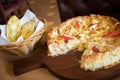Deep dish seafood pizza Chicago style with cheese garlic bread on the side Royalty Free Stock Photo