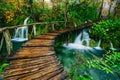 Deep forest stream with crystal clear water with pathway. Plitvice lakes Royalty Free Stock Photo