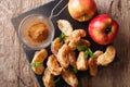 Deep-fried apples with cinnamon and sugar close-up. Horizontal t Royalty Free Stock Photo