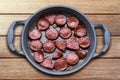 Deep-fried beef sausage in a pan. type of meat used in Turkish breakfasts Royalty Free Stock Photo