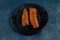 deep fried brinjal pakora or beguni served in a dish isolated on background top view of Indian and bengali food