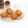 Deep fried bunuelos balls. Creative minimalist composition on a white background Royalty Free Stock Photo