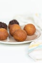 Deep fried bunuelos balls. Creative minimalist composition on a white background Royalty Free Stock Photo