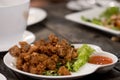 Deep fried chicken tendons with chili sauce Royalty Free Stock Photo