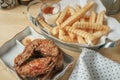 Deep fried chicken wing and french fries Royalty Free Stock Photo