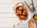 Deep fried chicken wing with garlic sauce in Korean style. Royalty Free Stock Photo