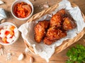 Deep fried chicken wing with garlic sauce in Korean style. Royalty Free Stock Photo