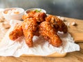 Deep fried chicken wing with garlic sauce in Korean style. Royalty Free Stock Photo