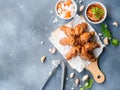 Deep fried chicken wing with garlic sauce in Korean style in to Royalty Free Stock Photo
