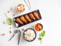 Deep fried chicken wing plate with garlic sauce in Korean style. Royalty Free Stock Photo