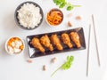 Deep fried chicken wing plate with garlic sauce in Korean style. Royalty Free Stock Photo