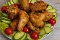 Deep fried chicken wings with crispy crust in flour Royalty Free Stock Photo