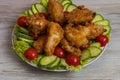 Deep fried chicken wings with crispy crust in flour Royalty Free Stock Photo