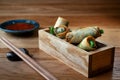 Deep fried chinese spring rolls spring rolls with sweet chili sauce. Asian appetizers or snacks popular with Thai and Royalty Free Stock Photo