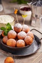 Deep fried cottage cheese balls or donuts. Freshly baked sweet croquettes, served sugar powder Royalty Free Stock Photo