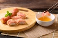 Deep fried crab sticks or surimi dipping with chili sauce Royalty Free Stock Photo