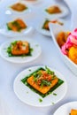 Deep Fried Fish Fillet with Spicy Sauce, Thai Fusion Food on White Table Royalty Free Stock Photo