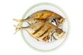 Deep fried fishes on plate on white table with clipping path