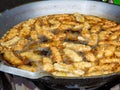 deep-fried fritters sliced banana, also known as Kluay khek frying in oil Royalty Free Stock Photo