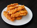 deep-fried fritters sliced banana, also known as Kluay khek, wooden table. Royalty Free Stock Photo