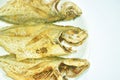 deep fried giant kingfish arranging on plate in white background