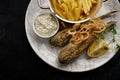Deep Fried goby fish with fried potatoes Royalty Free Stock Photo