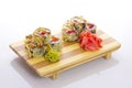 Deep-fried Japanese roll with red caviar avocado and unagi sauce Royalty Free Stock Photo