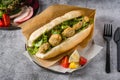 Deep fried mussels in bread and with greens on the side. Turkish name Midye Tava Royalty Free Stock Photo