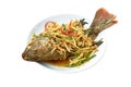 Deep fried Nile Tilapia or mango fish slice dressing soy sauce and spring onion on plate Royalty Free Stock Photo