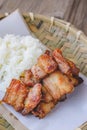 Deep fried pork with sticky rice on wood basket, thai food, thai