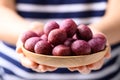 Deep fried purple sweet potato balls with hand Royalty Free Stock Photo