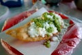 Deep-Fried Quesadilla topped with salsa in Mexico City