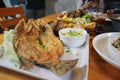 Deep fried sea bass with fish sauce and spicy seafood sauce is a popular dish for seafood restaurants that often have a menu of Royalty Free Stock Photo