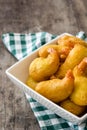 Deep fried shrimps in a bowl on wooden background Royalty Free Stock Photo
