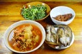 Deep fried snake head fish eat couple with mixed vegetable Thai spicy and sour soup Royalty Free Stock Photo