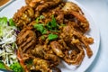 Deep fried soft shell crab with garlic and pepper Royalty Free Stock Photo