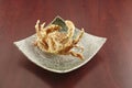 deep fried Soft Shell Crab served in a dish isolated on wooden table side view of singapore food Royalty Free Stock Photo