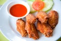 Deep fried spicy chicken wing with sauce Royalty Free Stock Photo